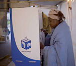 A woman voting in South Africa.